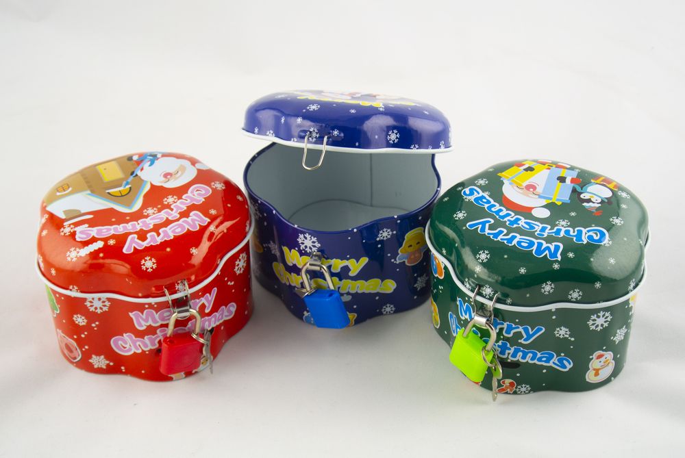 Скарбничка металева "Санта Клаус, Сніговик" 10см Різнокольоровий Unison (DME-030-M)