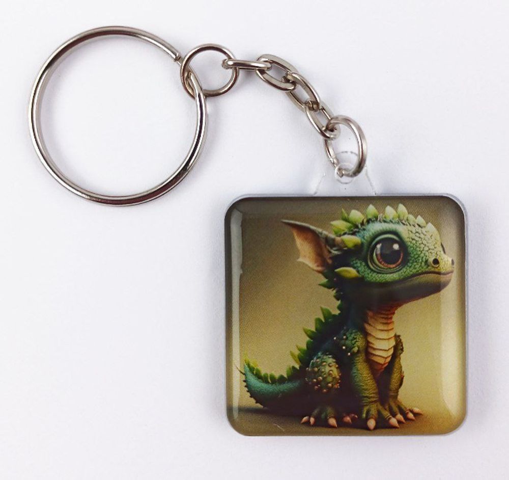 Брелок "Милый дракончик" двусторонний 35мм Разноцветный Unison (Dk 002)